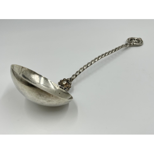 1211 - An antique Maltese .875 grade silver ladle - approx. gross weight 64 grams and approx. 21cm long x 6... 