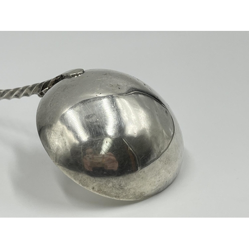 1211 - An antique Maltese .875 grade silver ladle - approx. gross weight 64 grams and approx. 21cm long x 6... 