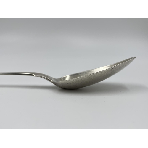 1213 - A George III hallmarked London silver serving spoon, dated 1810 - approx. gross weight 66 grams and ... 