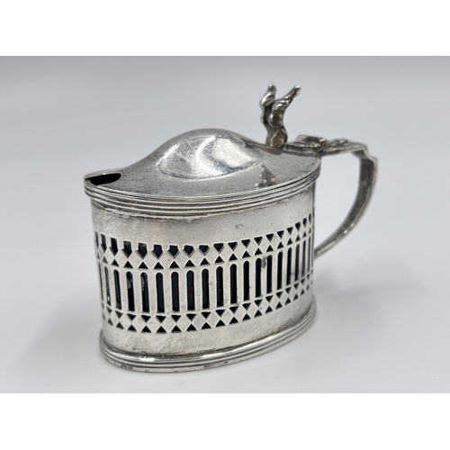 1219 - A Stokes & Ireland Ltd. George V hallmarked London silver mustard pot with pierced central decoratio... 