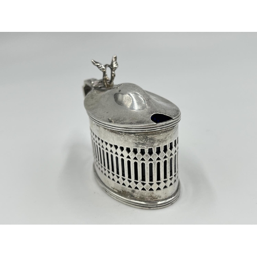 1219 - A Stokes & Ireland Ltd. George V hallmarked London silver mustard pot with pierced central decoratio... 