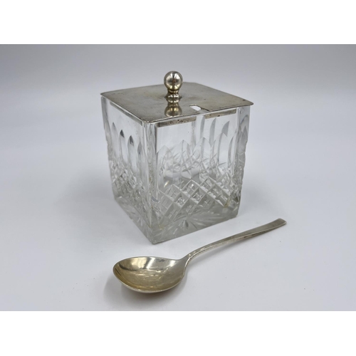 1229 - A H. Pidduck & Sons hallmarked Sheffield silver and cut glass condiment pot with matching spoon, lid... 