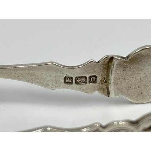 1234 - Five antique hallmarked sterling silver sugar tongs to include Edwardian Sheffield silver with claw ... 