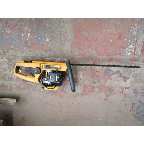 663 - A JCB petrol hedge trimmer