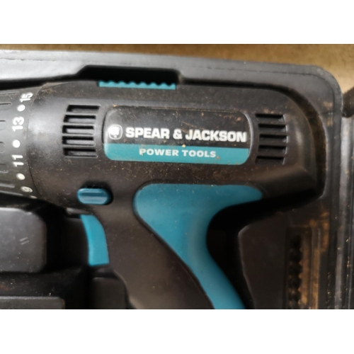 677 - Two cased cordless hammer drills with batteries and chargers, one Power Devil and one Spear & Jackso... 