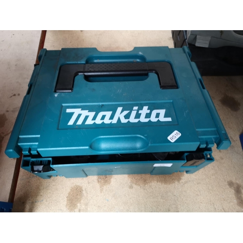 679 - Two cased Makita cordless grinding wheels with two batteries and charger