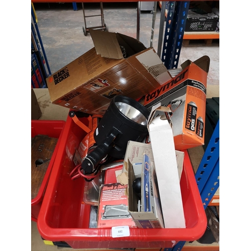 682 - A collection of assorted tools to include Maxim rechargeable halogen spotlight, boxed Black & Decker... 