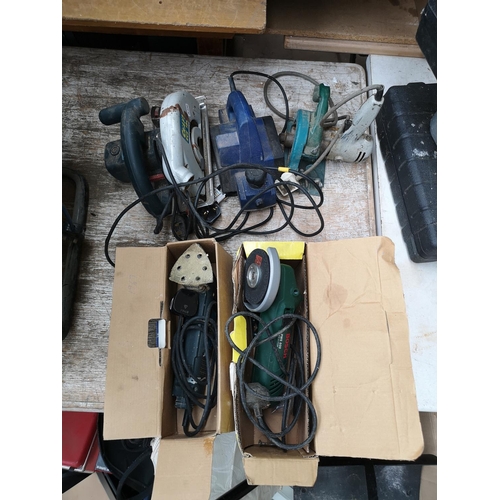 702 - Five various 240v handheld power tools to include boxed Bosch angle grinder, boxed Powercraft sander... 