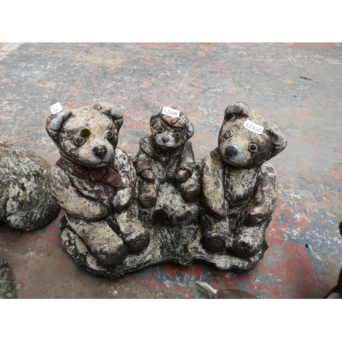 707 - A collection of cast stone animal garden ornaments to include fox, bears, squirrels etc.