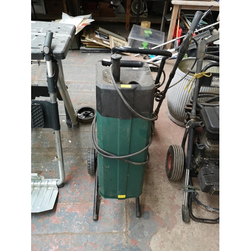 714 - A 240v garden shredder