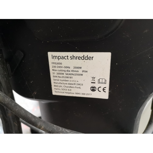 714 - A 240v garden shredder