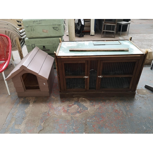 733 - Two items, one wooden rabbit hutch - approx. 76cm high x 118cm long x 60cm deep and one plastic dog ... 