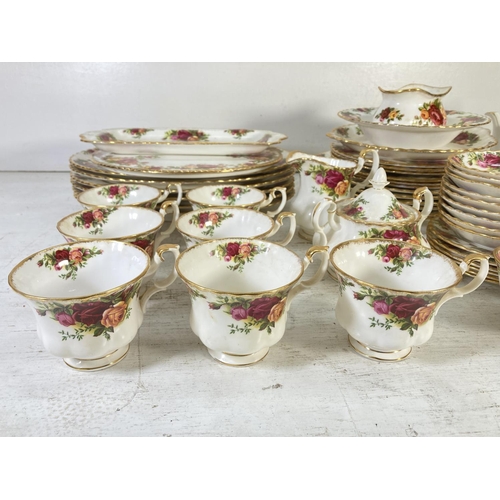 43 - A large collection of Royal Albert Old Country Roses fine bone china to include nine tea cups, nine ... 