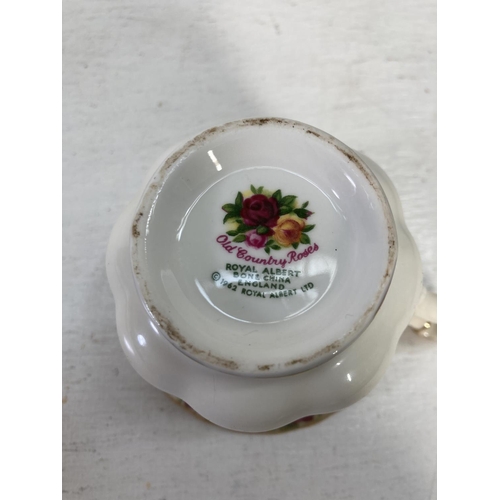 43 - A large collection of Royal Albert Old Country Roses fine bone china to include nine tea cups, nine ... 