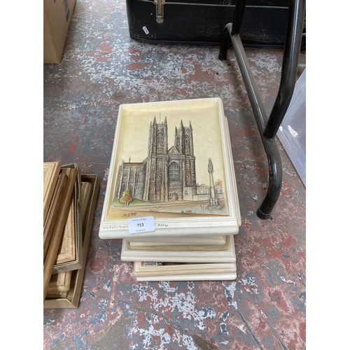 753 - A large quantity of chalkware wall plaques to include Bossons Ivorex hand painted Lincoln Cathedral,... 