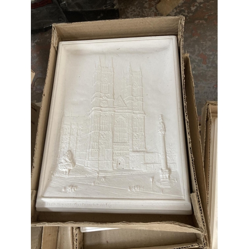 753 - A large quantity of chalkware wall plaques to include Bossons Ivorex hand painted Lincoln Cathedral,... 