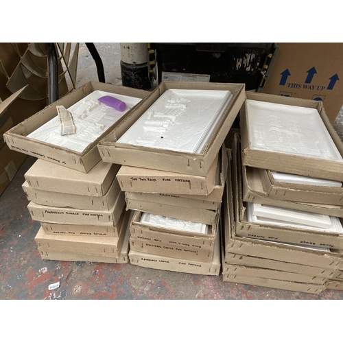 753 - A large quantity of chalkware wall plaques to include Bossons Ivorex hand painted Lincoln Cathedral,... 