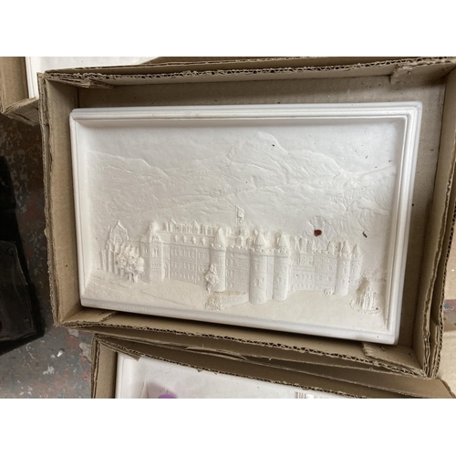 753 - A large quantity of chalkware wall plaques to include Bossons Ivorex hand painted Lincoln Cathedral,... 