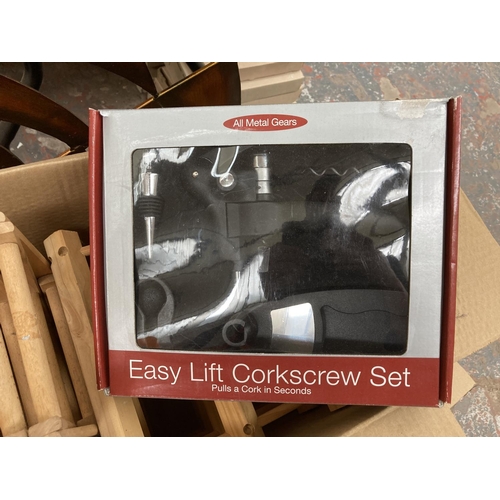 754 - Two boxes containing boxed Easylift corkscrew set, wooden wine rack, pewter tankard, Naturecraft Mer... 