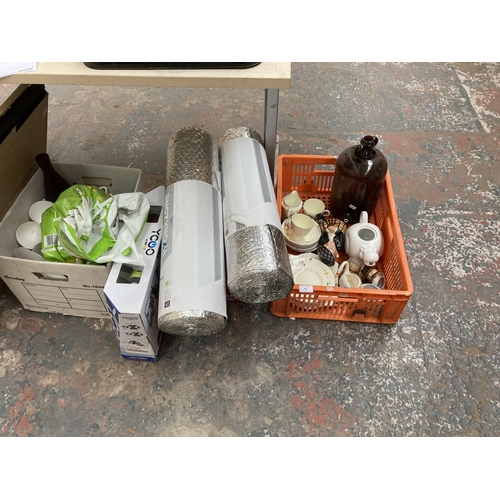 755 - A collection of items to include brown glass demijohn, ceramics, Workzone insulation wrap, boxed rad... 