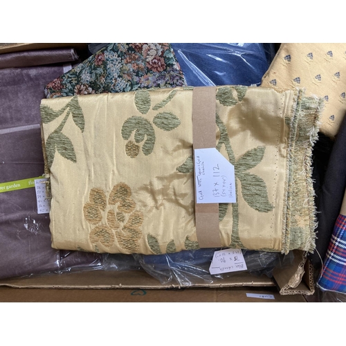 761 - Two boxes containing a collection of fabric to include roll of upholstery fabric, vintage 1950s blue... 