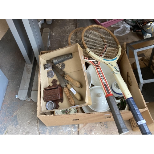 763 - Three boxes containing ceramics, vintage wooden tennis rackets, driftwood, vintage kitchen knives et... 