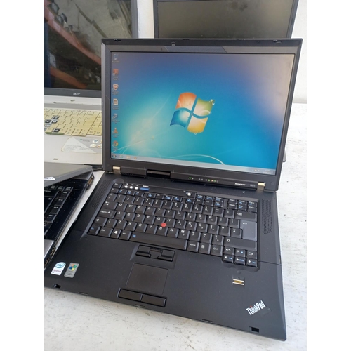 583 - Four laptops, one Lenovo ThinkPad Windows XP Professional with power supply, two HP (A/F) and one Ac... 