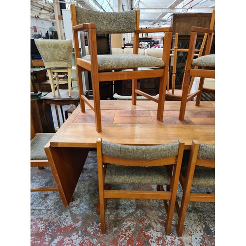 382 - A Danish 'AM' teak and tiled top rectangular dining table and six matching chairs - approx. 73cm hig... 