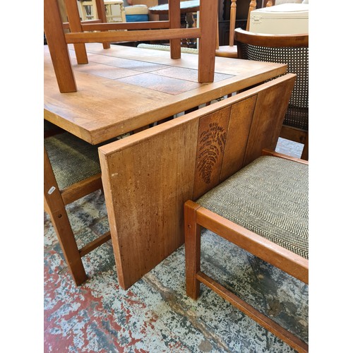 382 - A Danish 'AM' teak and tiled top rectangular dining table and six matching chairs - approx. 73cm hig... 