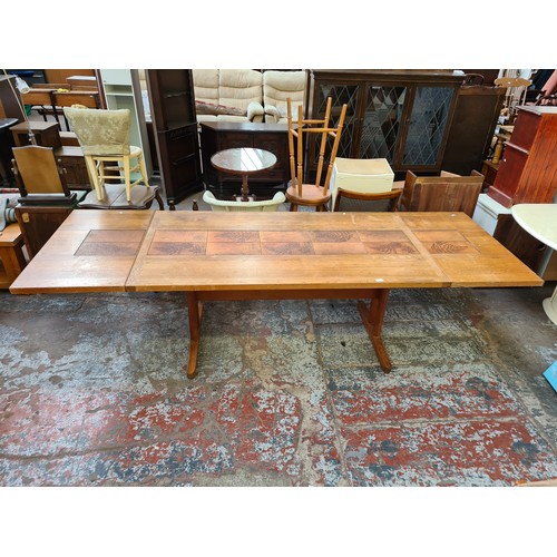 382 - A Danish 'AM' teak and tiled top rectangular dining table and six matching chairs - approx. 73cm hig... 