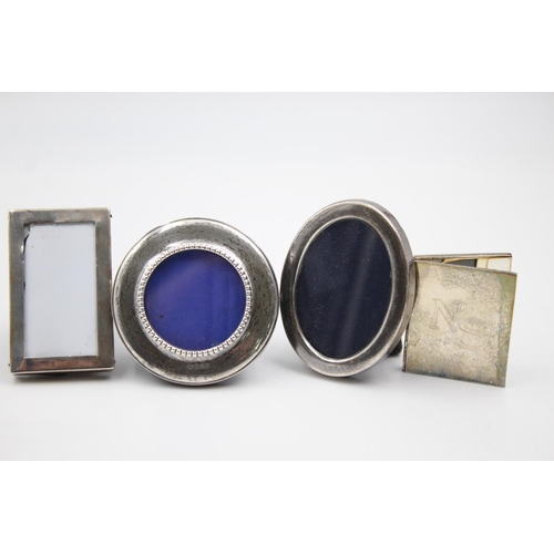 1188 - Four assorted hallmarked .925 sterling silver photograph frames