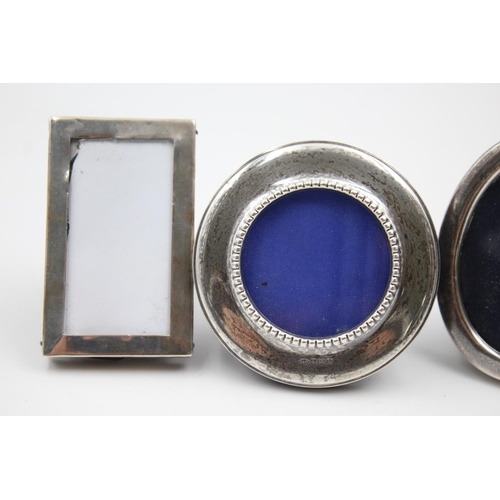 1188 - Four assorted hallmarked .925 sterling silver photograph frames