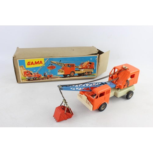 188 - A vintage boxed Gama tinplate model 240/241 crane excavator