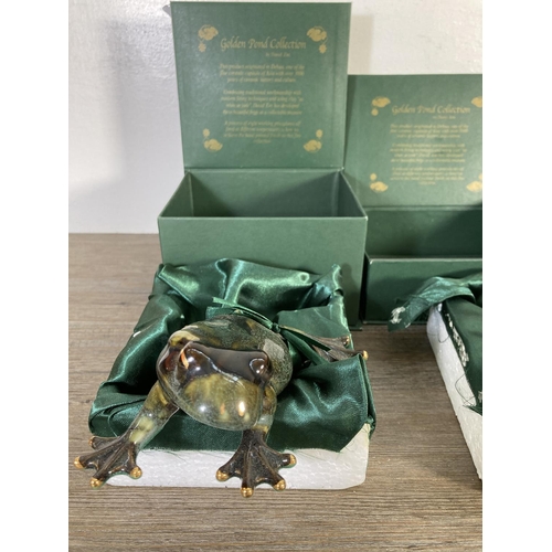 101 - Four boxed Golden Pond Collection by David Ent. ceramic frog figurines