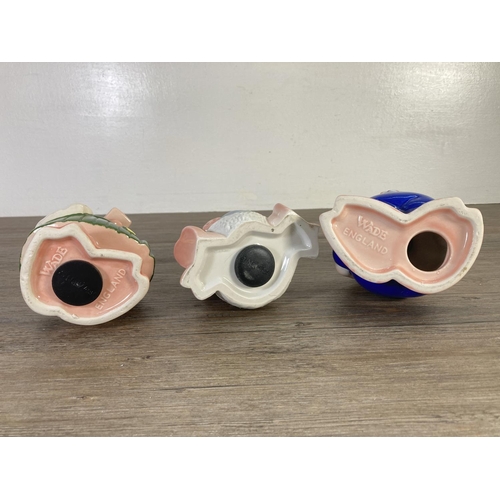 73 - Three ceramic pig money boxes, two Wade Natwest and one unstamped