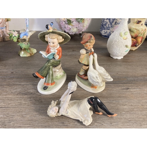 77 - A collection of assorted china to include 19th century hand painted porcelain lamp base with cherub ... 