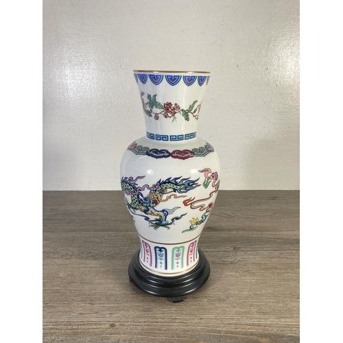 77 - A collection of assorted china to include 19th century hand painted porcelain lamp base with cherub ... 