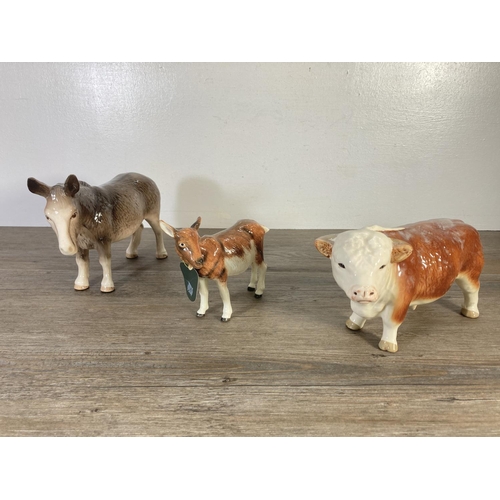 80 - Nine ceramic animal figurines to include Coopercraft bull, Sylvac 3142 Yorkshire Terrier, Melba Ware... 