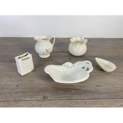 81 - Fifteen pieces of Belleek China to include ashtray, harp figurine, harp butter plate, egg shaped tri... 