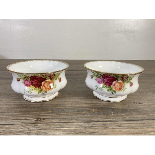 99 - Sixteen pieces of Royal Albert Old Country Roses china to include five cups, five saucers, two sugar... 