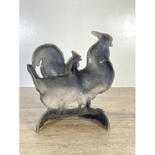 120 - A Victorian style painted cast iron cockerel and hen doorstop - approx. 29cm high