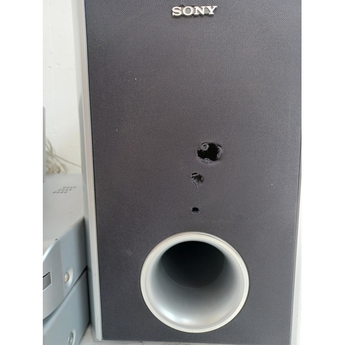 571 - Two Sony items, one DAV-DZ111 DVD home theatre system comprising DVD player and three speakers with ... 