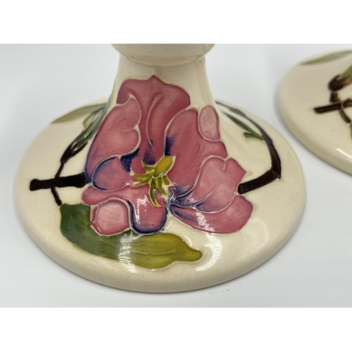 10 - A pair of Moorcroft Pottery Pink Magnolia pattern candlesticks - approx. 8.5cm high x 10cm diameter