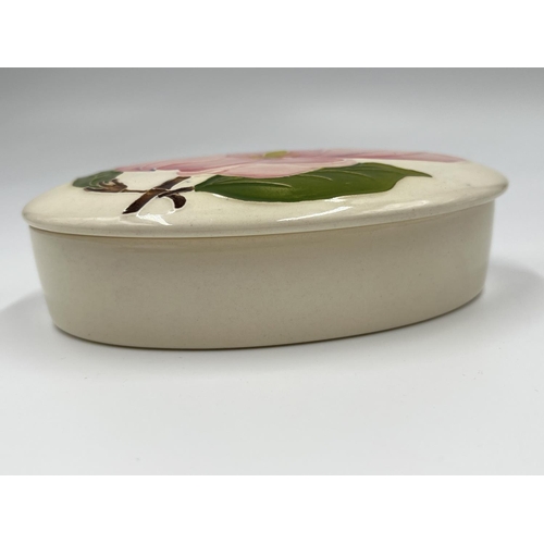 11 - A Moorcroft Pottery Pink Magnolia pattern oval lidded trinket box - approx. 3.5cm high x 9cm wide x ... 