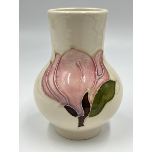 12 - A Moorcroft Pottery Pink Magnolia pattern baluster vase - approx. 10.5cm high