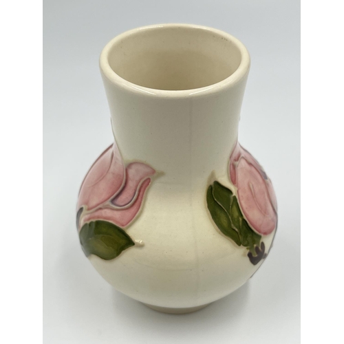 12 - A Moorcroft Pottery Pink Magnolia pattern baluster vase - approx. 10.5cm high