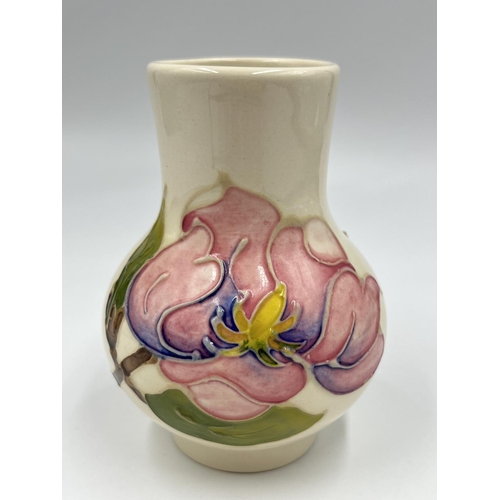 13 - A Moorcroft Pottery Pink Magnolia pattern baluster vase - approx. 10.5cm high