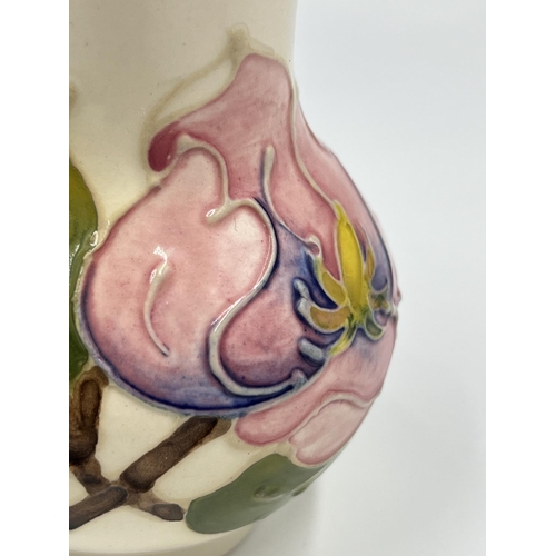 13 - A Moorcroft Pottery Pink Magnolia pattern baluster vase - approx. 10.5cm high