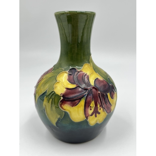 14 - A Moorcroft Pottery Hibiscus pattern vase - approx. 13cm high