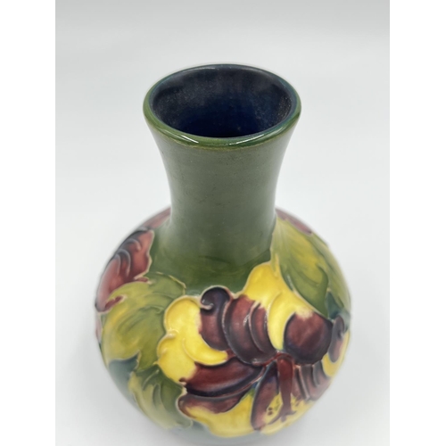 14 - A Moorcroft Pottery Hibiscus pattern vase - approx. 13cm high